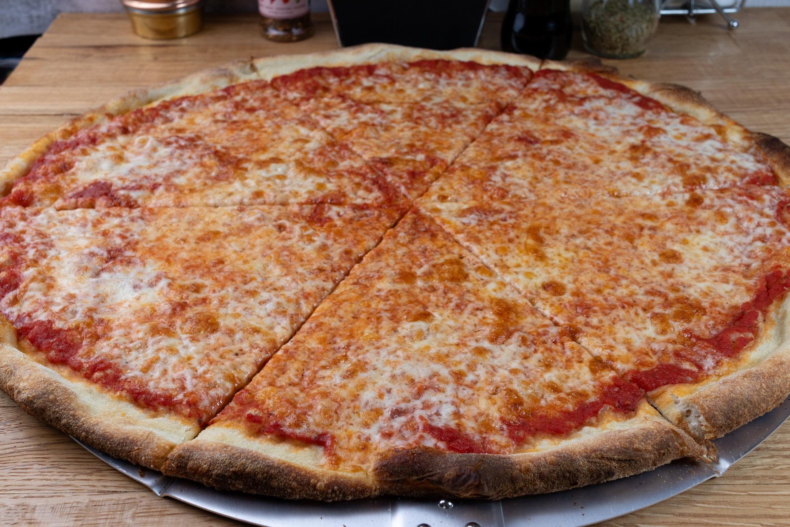 20-inch NY-style pizza with cheese and toppings